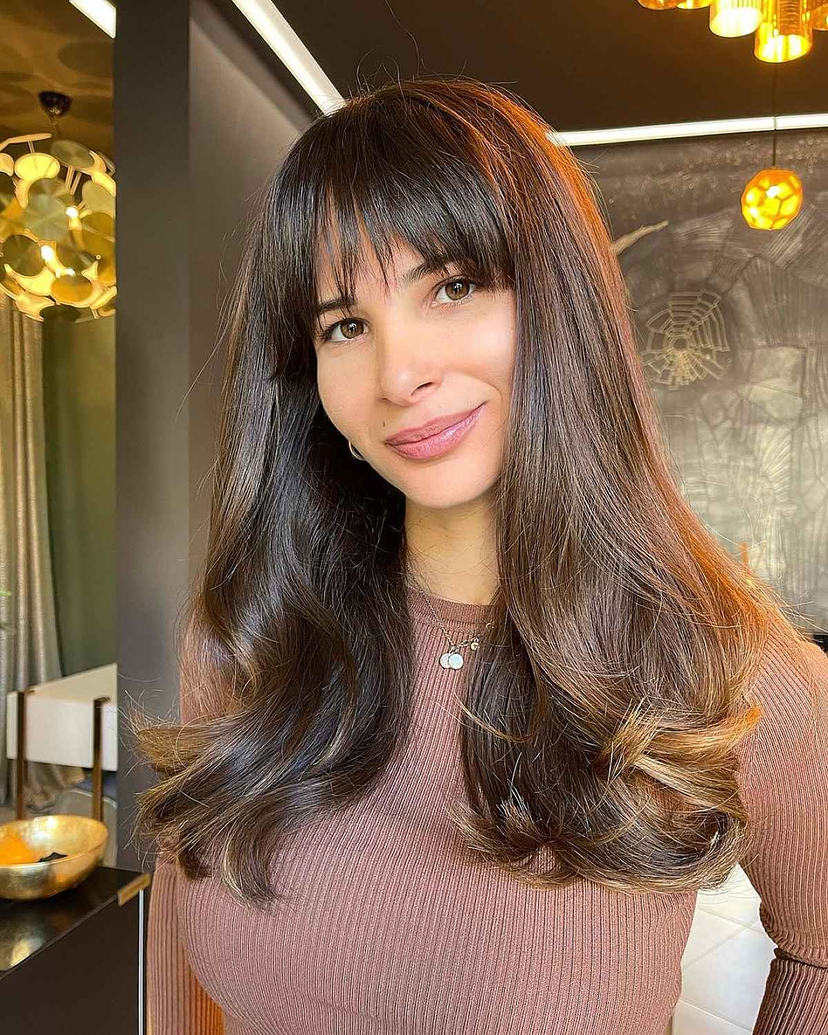 Soft Blown-Out Long Hair with Wispy Bangs