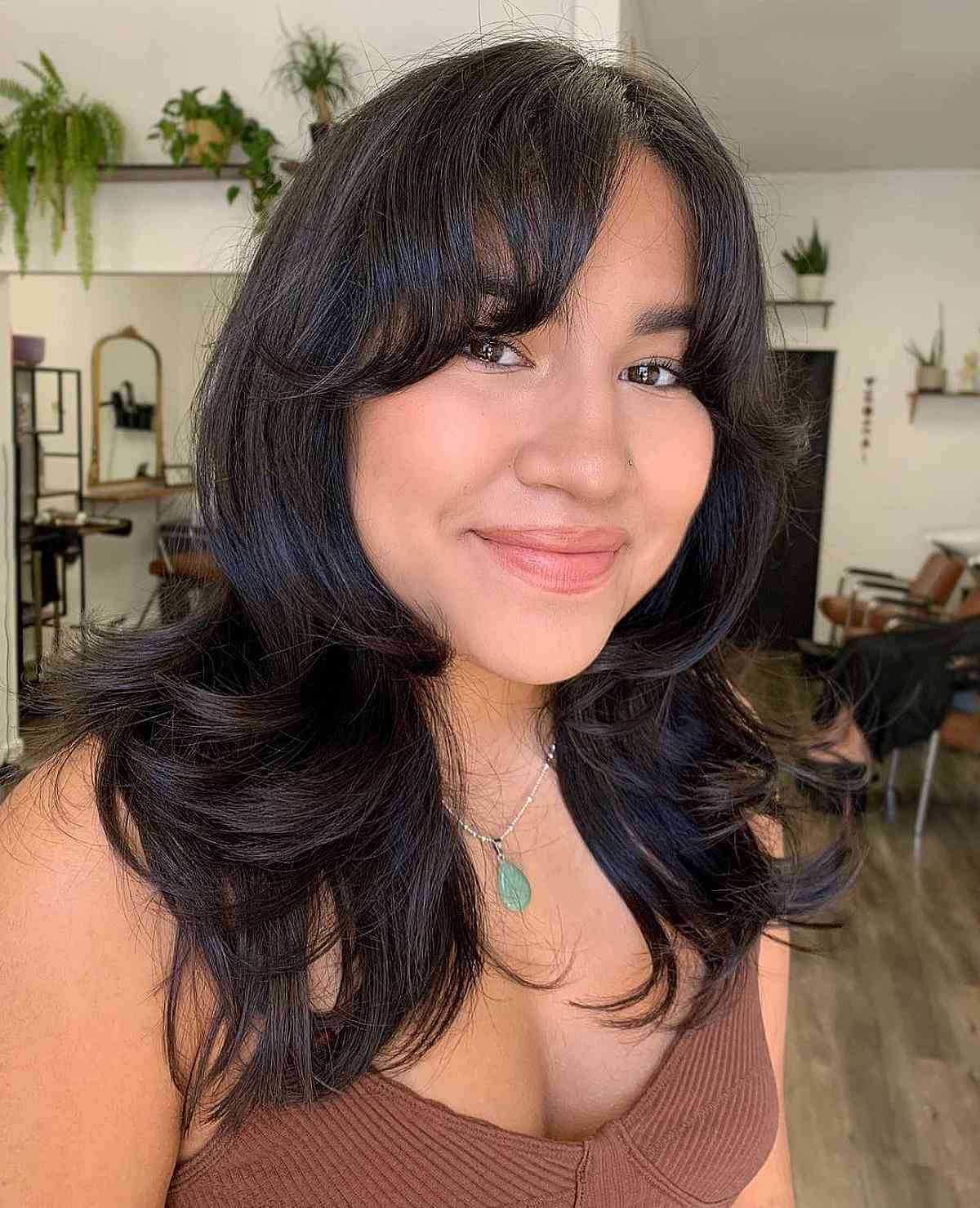 Soft Curled Layers with Curtain Bangs on Mid-Length Hair