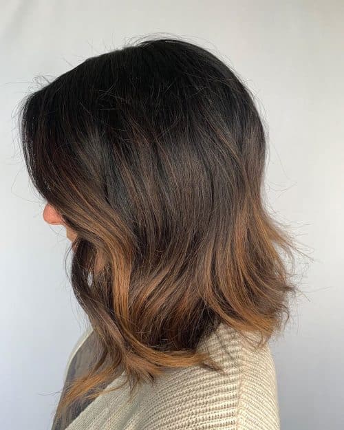 Sophisticated dark brunette balayage lob