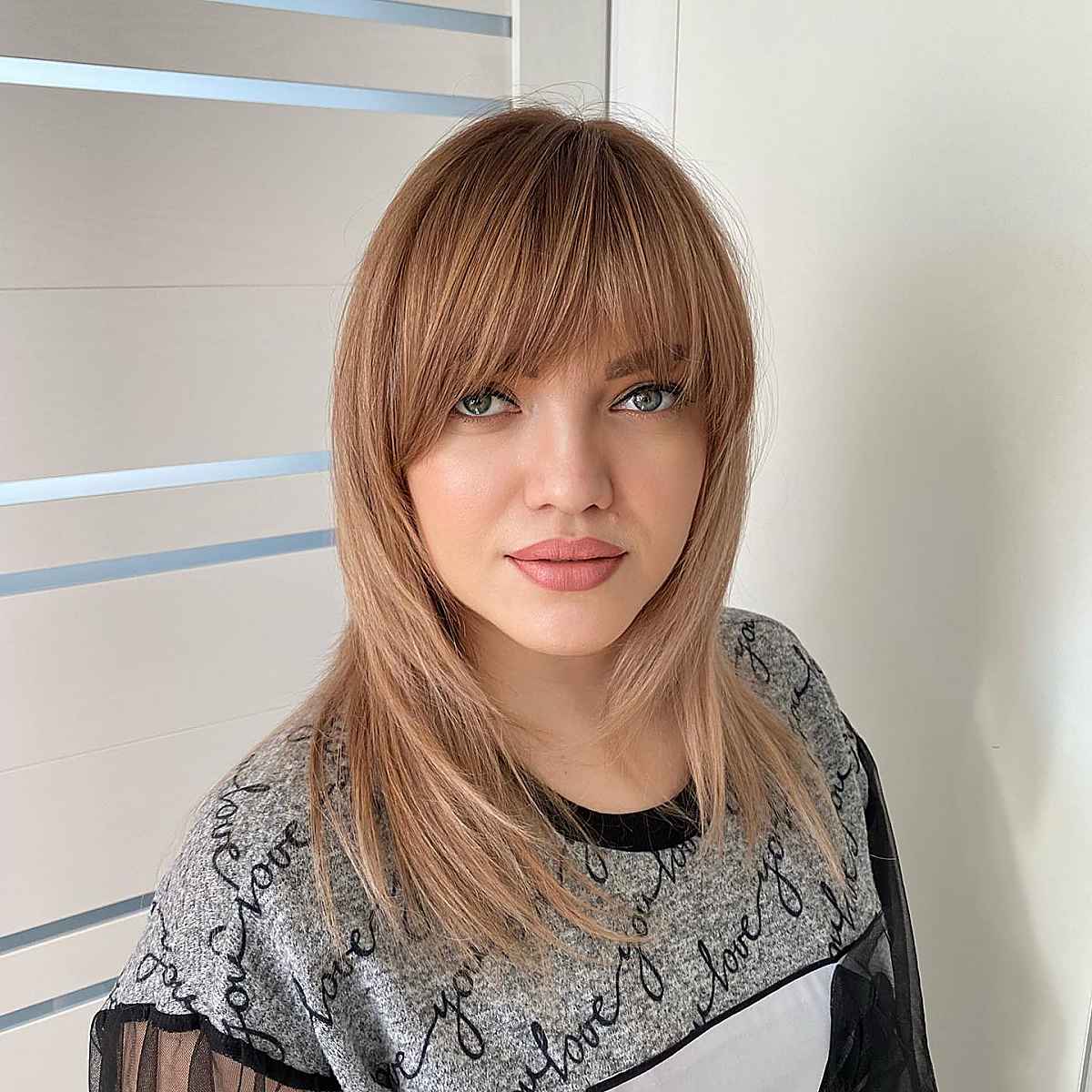 straight face-framing layers with bangs