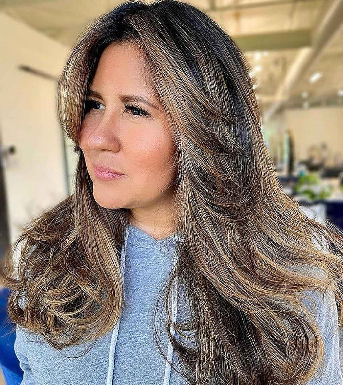 straight layered blowout for women over 40 with long hair