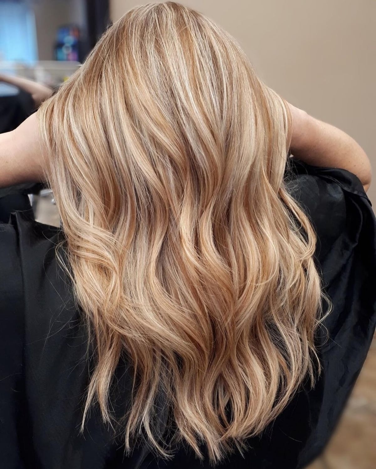 Strawberry blonde highlights on light blonde hair