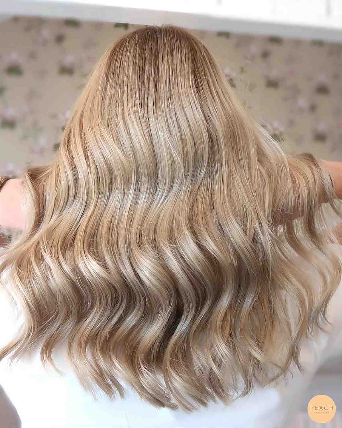 Sun-kissed light beige blonde hair color