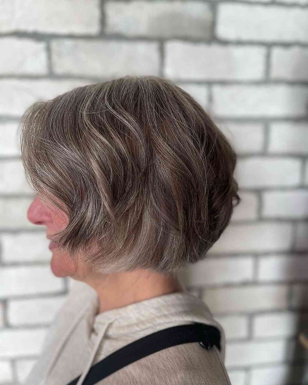 Textured Jaw-Length Bob with Grey Blending for Women Over 60