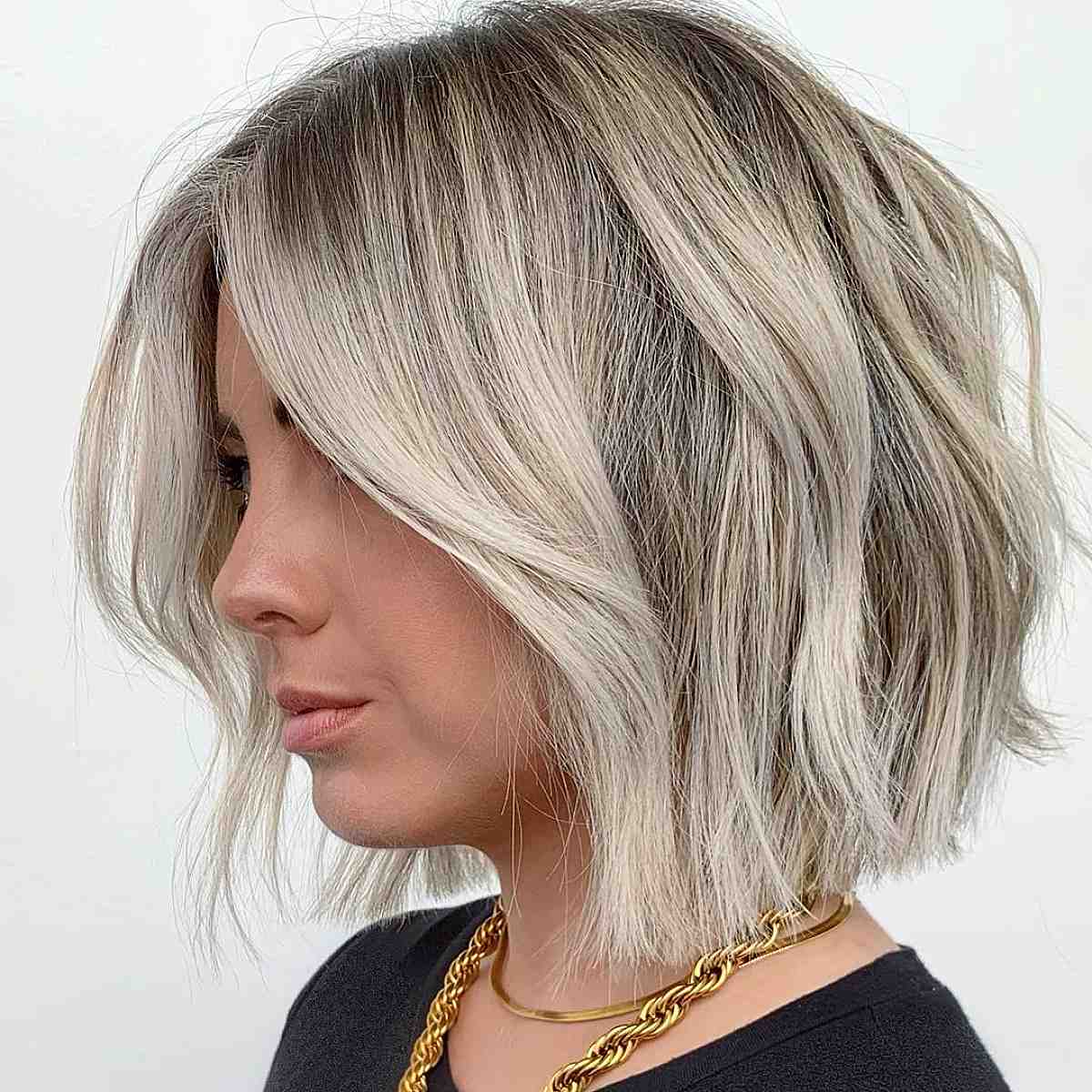 textured sandy blonde blunt bob hairstyle