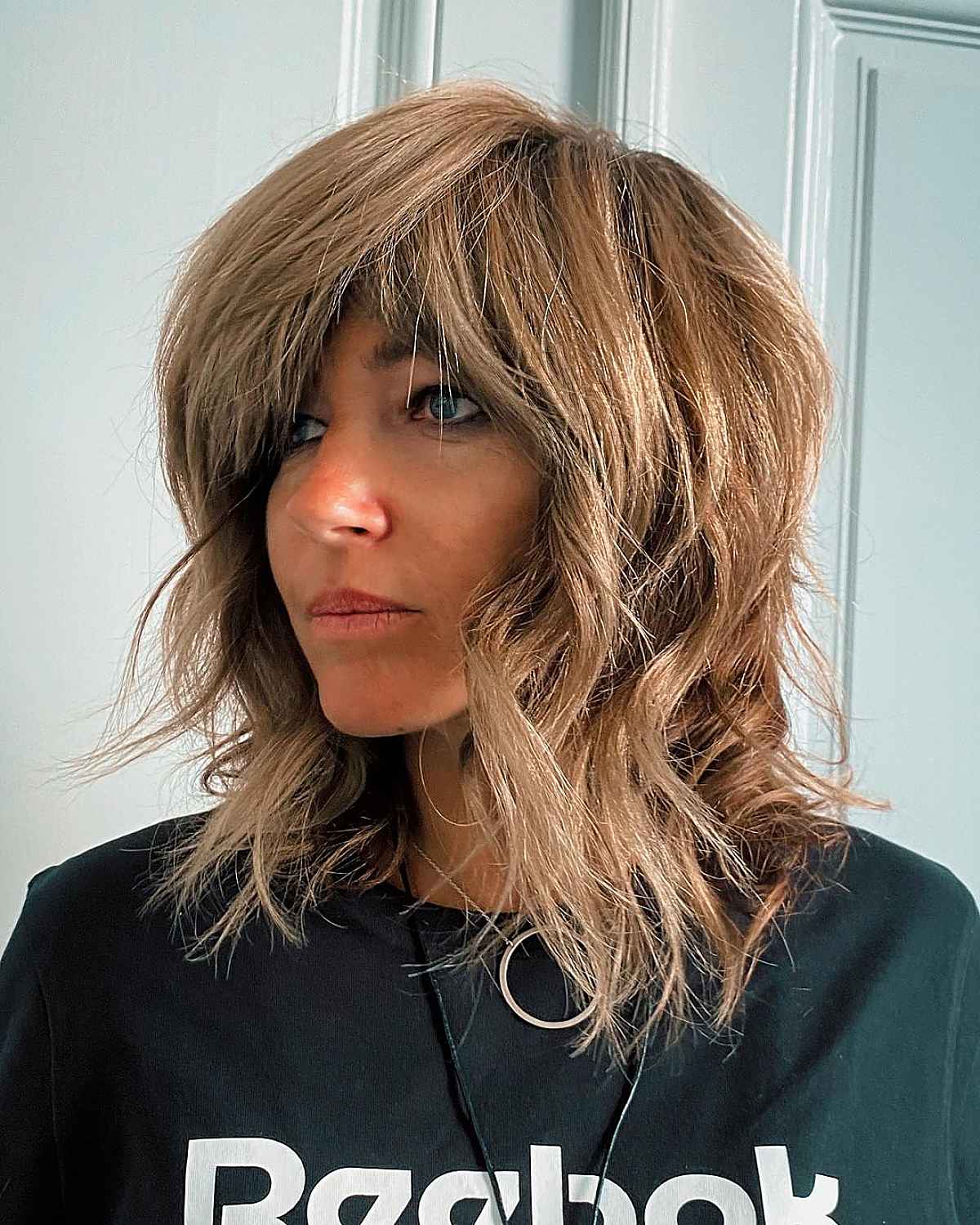 Tousled Style with Side-Swept Bangs