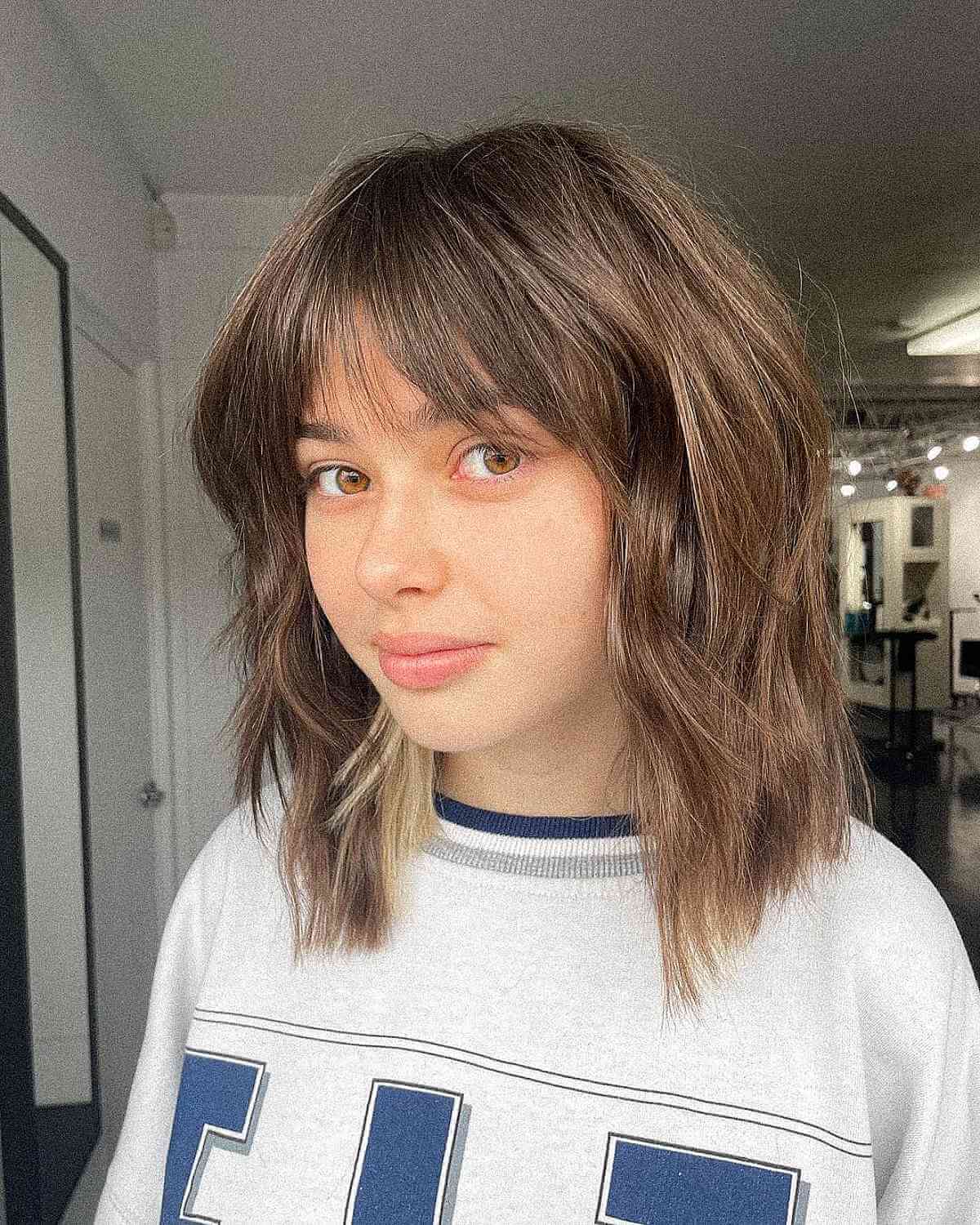 Trendsetting Mid-Length Bob with Bangs