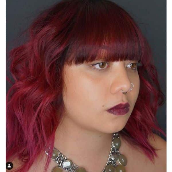 Vivid Red Medium Haircut With Straight Bangs