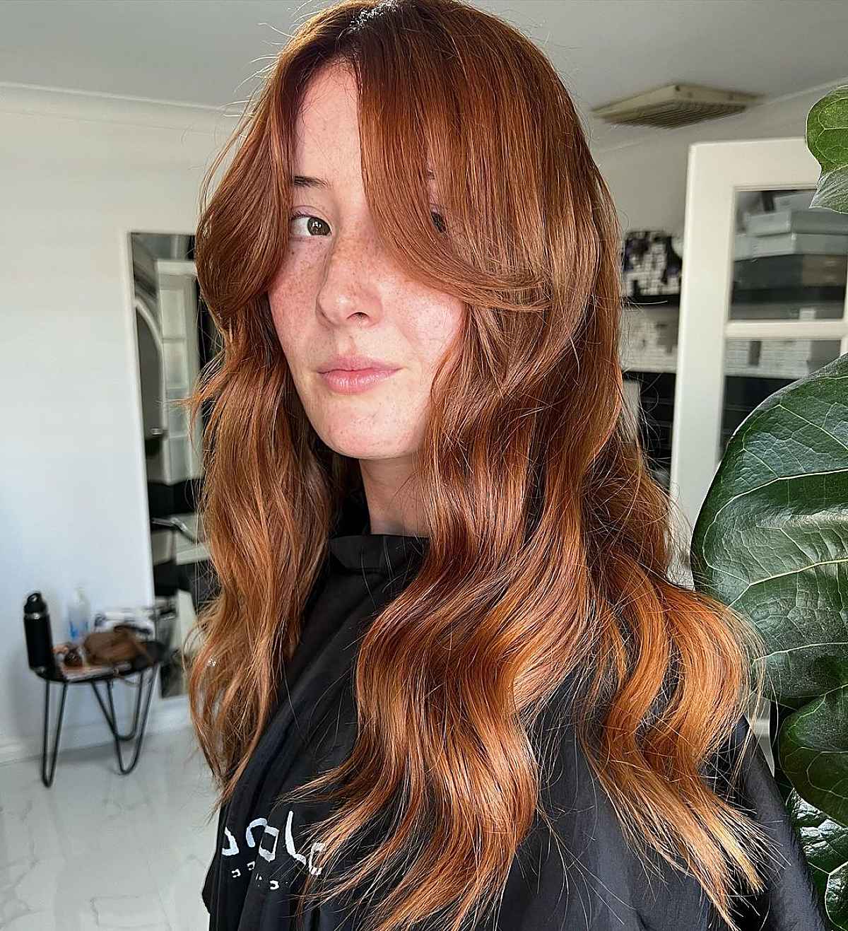 Wavy Copper Hair with Long Curtain Bangs