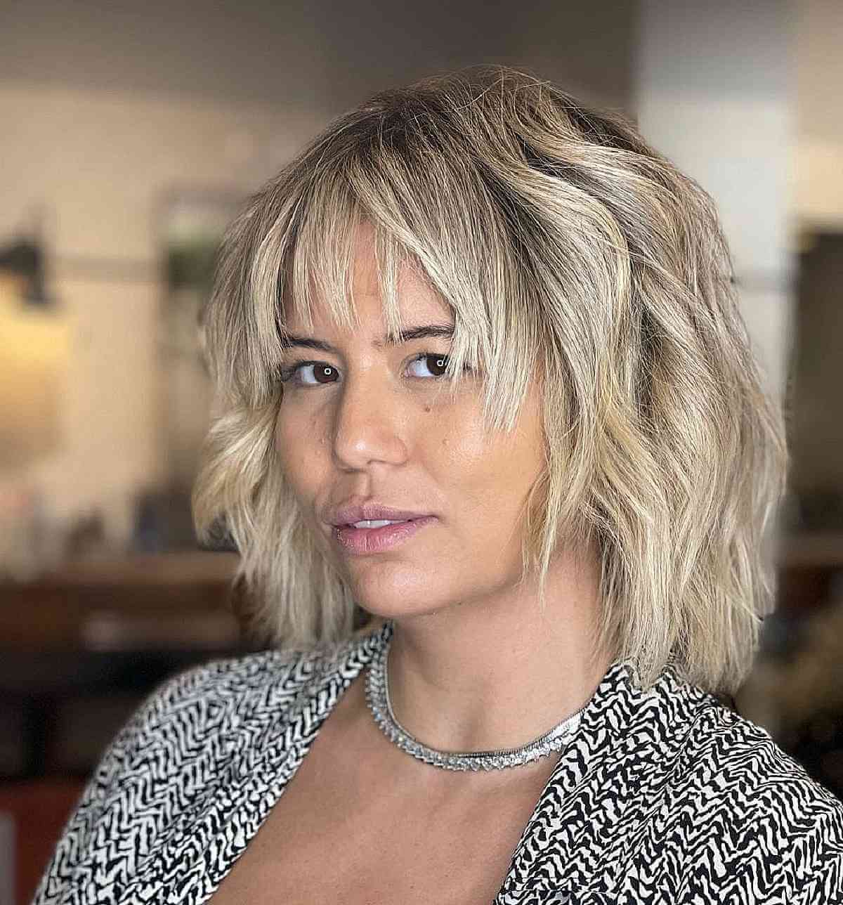 Wispy Piece-y Bangs on Textured Short Layered Hair