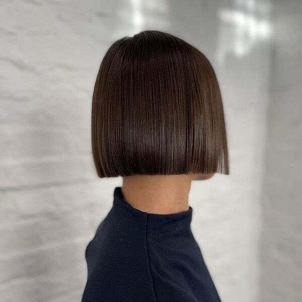 Super Short Straight Bob - a woman wearing of turtle neck