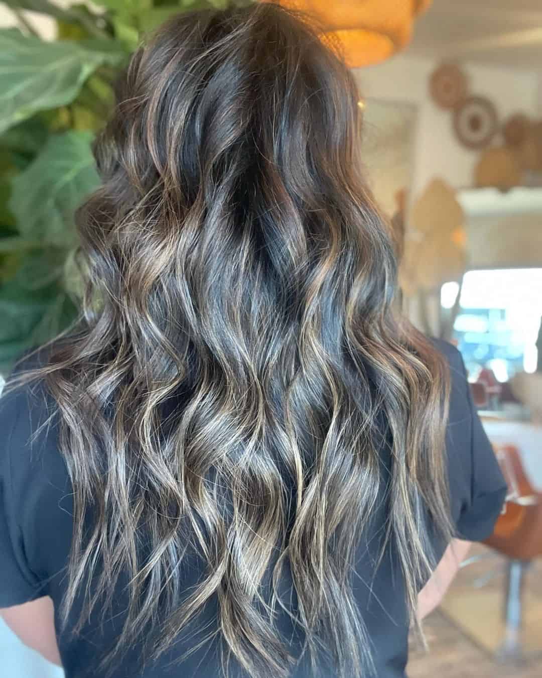 Unveiling the Beauty of Blonde Highlights on Dark Locks