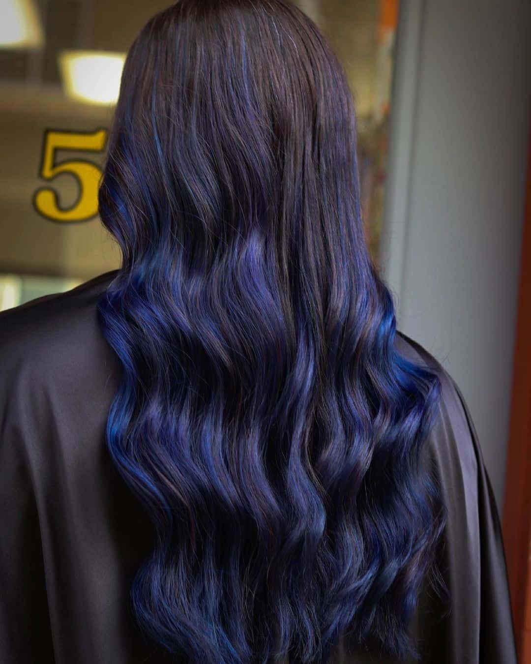 Enchanting Shades: Blue Black Hair Styles for Every Mood