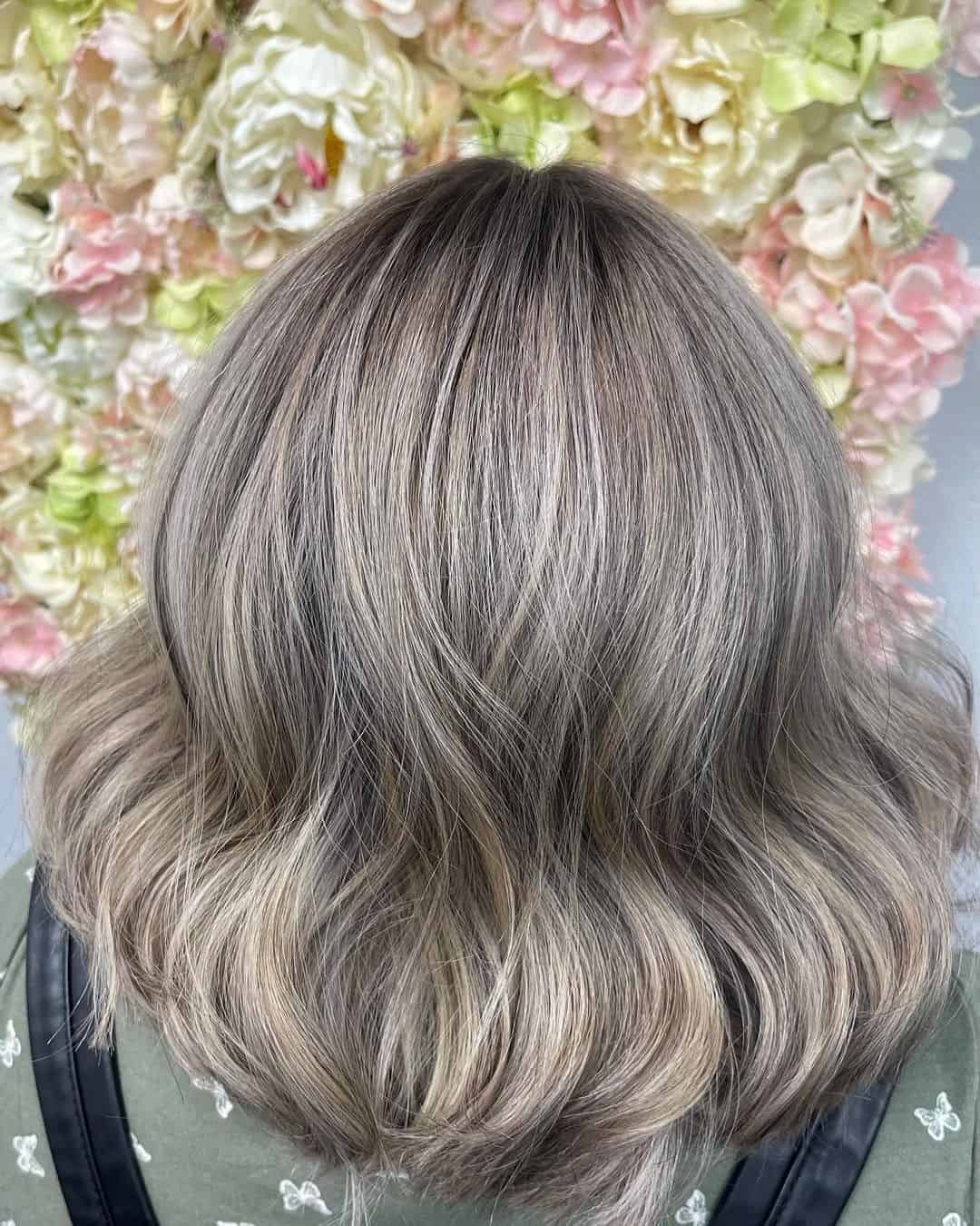 Unveiling the Beauty of Blonde Highlights on Dark Locks