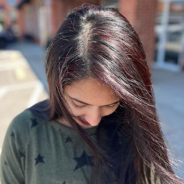 a girl wearing a printed gray shirt