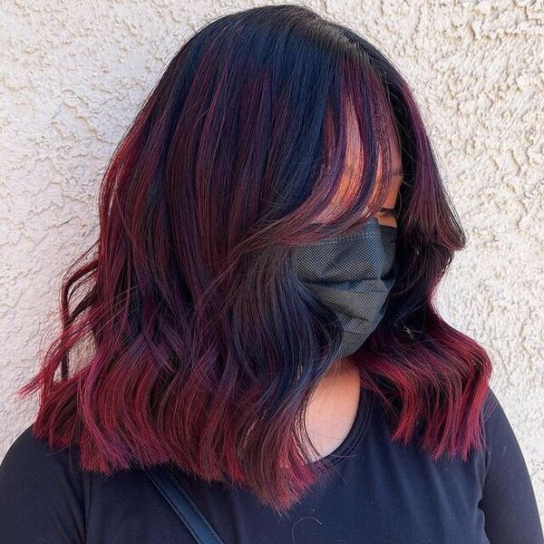 a girl wearing black mask and shirt