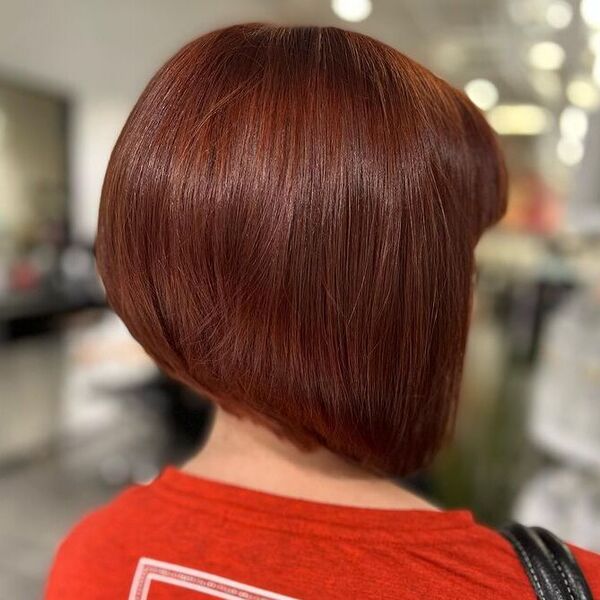 A-line Blunt Bob in Red Brown Hair - a woman wearing red shirt.