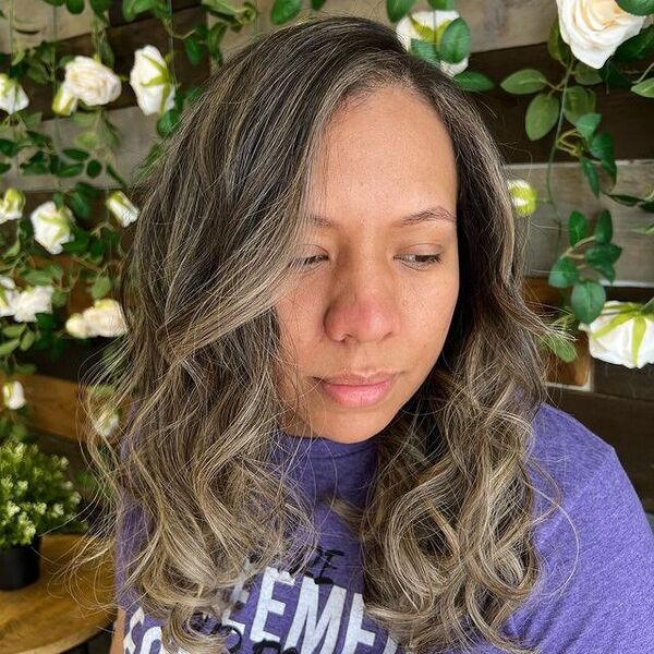 a woman wearing a purple shirt