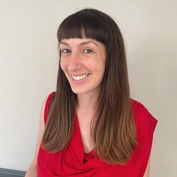 a woman wearing a red blouse