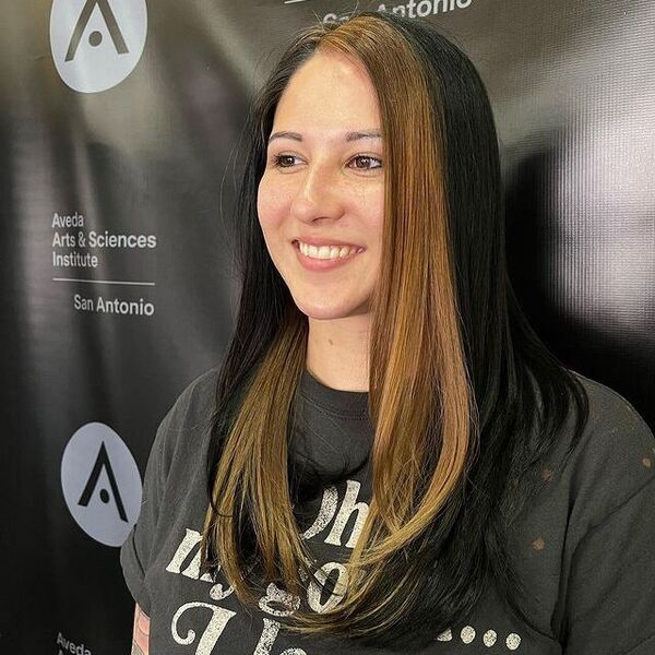 a woman wearing black printed shirt