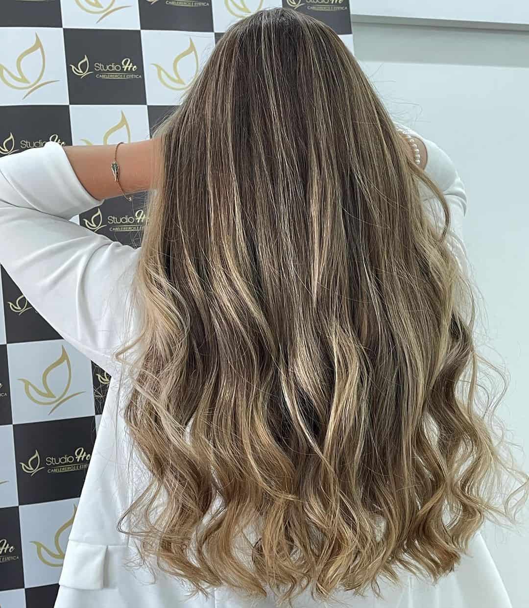 Blonde And Caramel Highlights On Black Hair Wavy Look