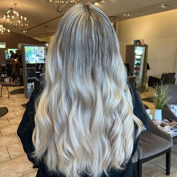 blonde highlights - a woman inside a salon