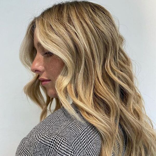 blonde highlights - a woman wearing a black and white longsleeve