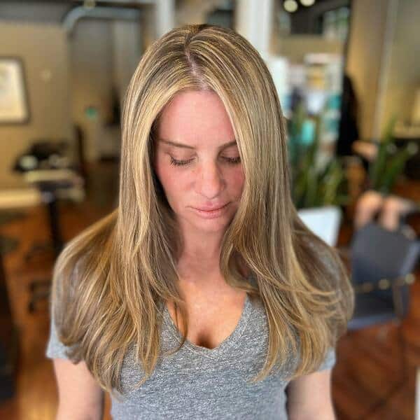 blonde highlights - a woman wearing a gray shirt