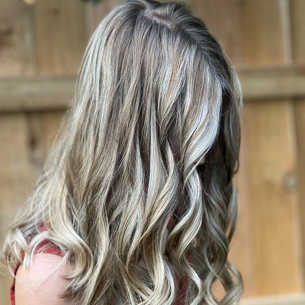 blonde highlights - a woman wearing a rust sleeveless top