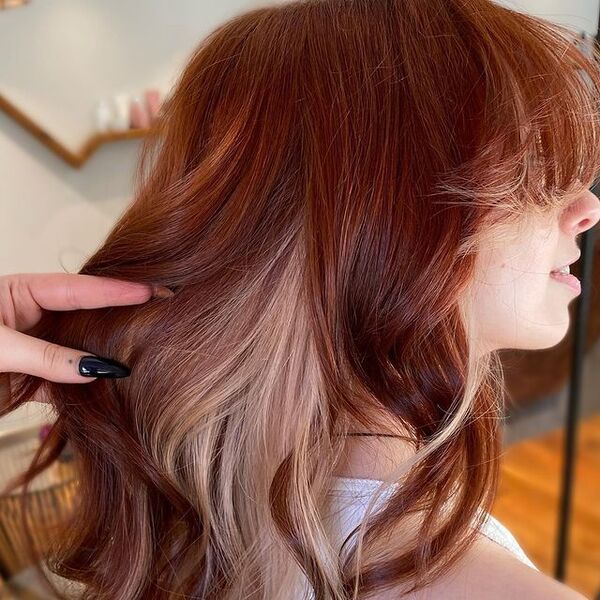 brown peekaboo hair - a girl wearing a sleeveless shirt