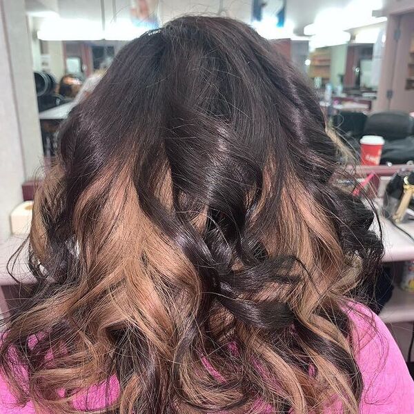 brown peekaboo hair - a girl wearing pink shirt