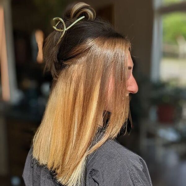 brown peekaboo hair - a woman wearing black shirt