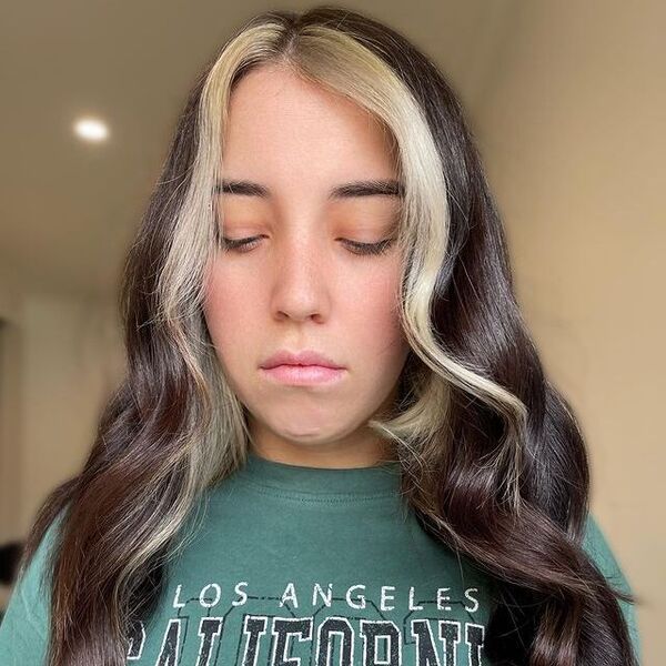 brunette - a woman wearing a green printed shirt