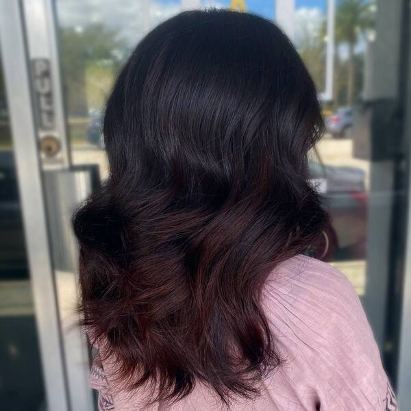 Cherry Cola Dark Balayage - a woman wearing blush pink blouse.