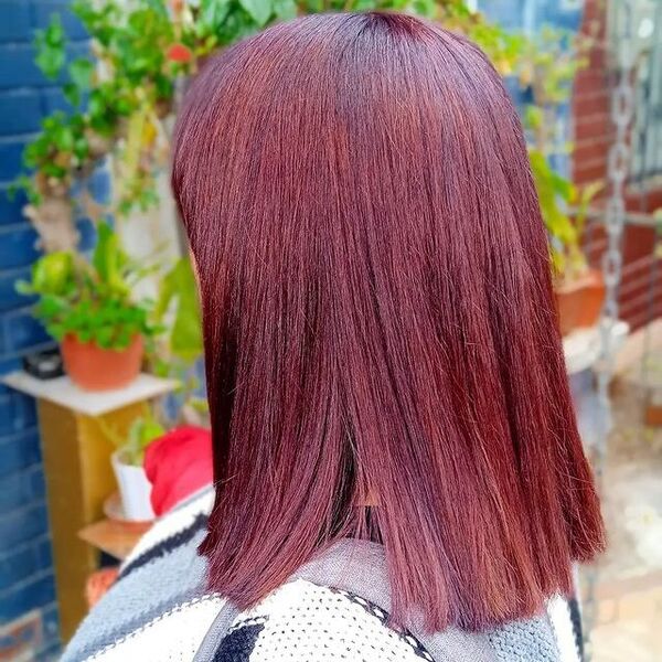 dark red hair - a girl wearing a knitted sweater