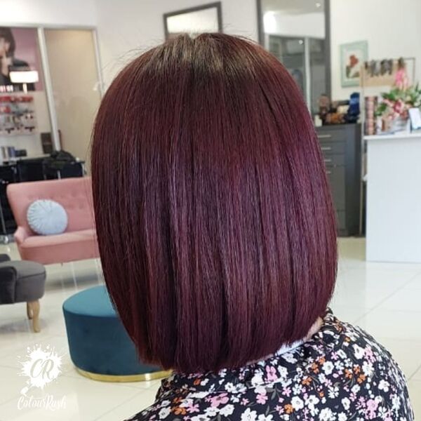 dark red hair - a girl wearing a printed dress