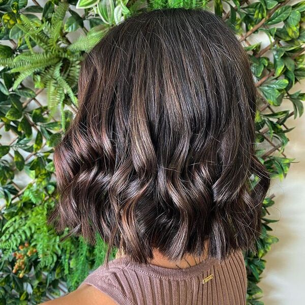 Darker Style Balayage - a woman wearing brown knitted tank top.