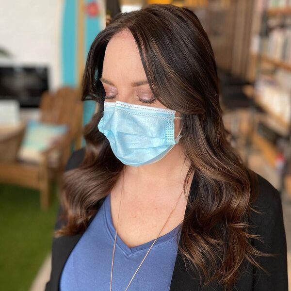 Fresh Toner Glaze Balayage - a woman wearing mask in black coat with purple under shirt.