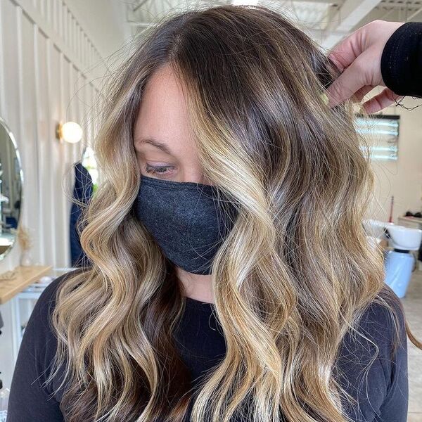 Front Streak Golden Blonde - a woman wearing a black shirt and a facemask