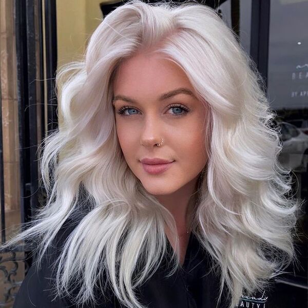 Gorgeous White Platinum Blonde Hair - a woman wearing a black cape