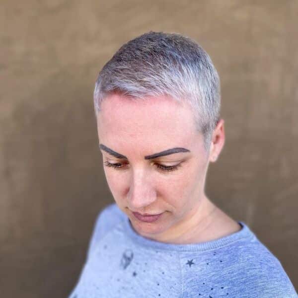 Ice Platinum Blonde for Short Pixie Cut - a woman in a gray printed shirt