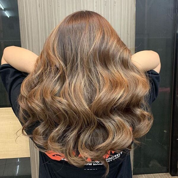 Light Ash Brown Hair - a woman wearing a black t shirt