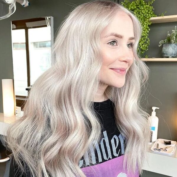 Long Creamy White Blonde Hair - a woman wearing a black printed shirt