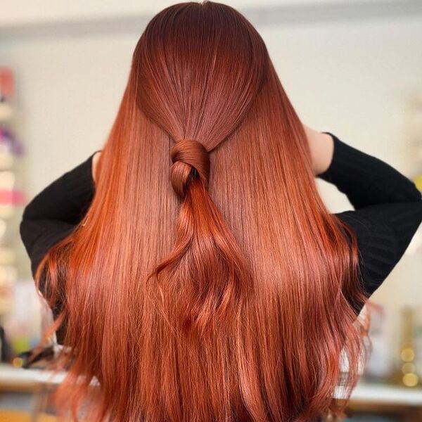 Long Length Copper Red Brown with Knot - a woman wearing black long sleeves.