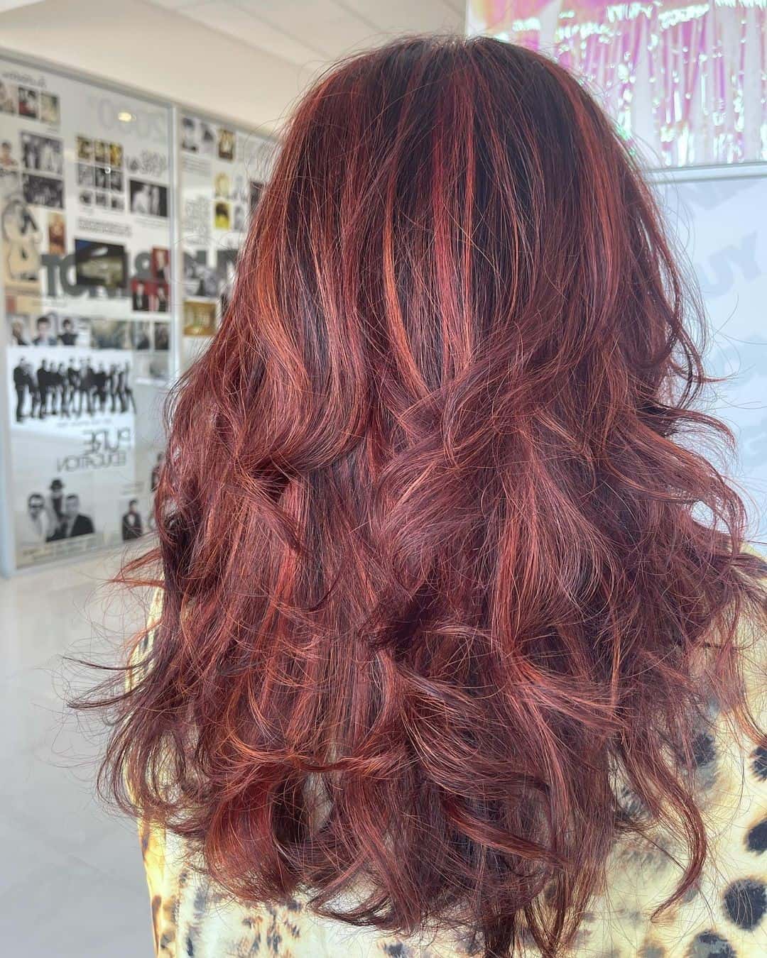 Messy & Voluminous Red Highlights On Black Hair