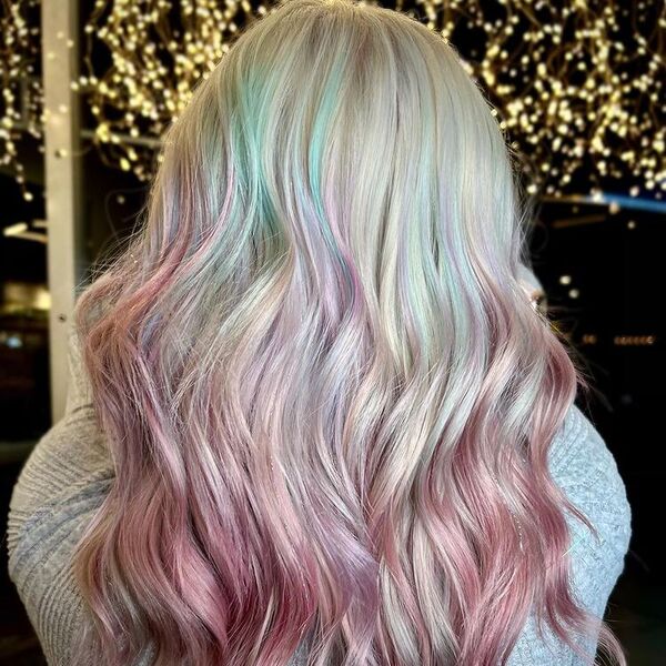 Opalescent Platinum Hair - a woman facing a series lights