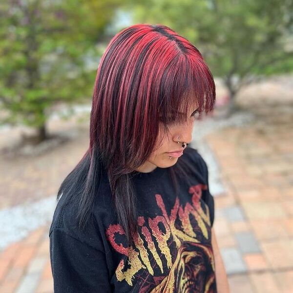 Red Highlights - a woman wearing a black printed shirt