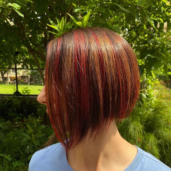 Red Highlights - a woman wearing a blue shirt