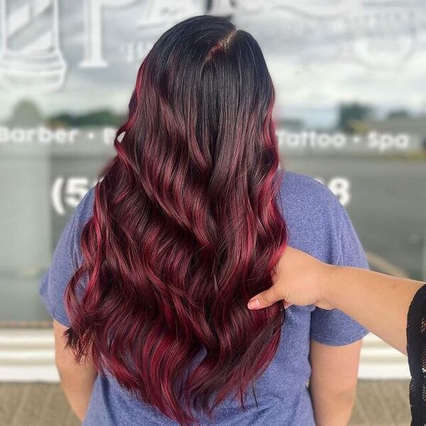 Red Highlights - a woman wearing a purple shirt