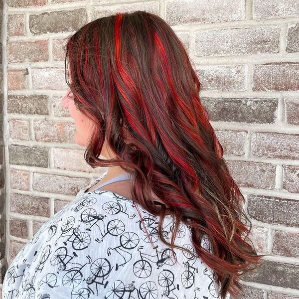 Red Highlights - a woman wearing a white printed blouse